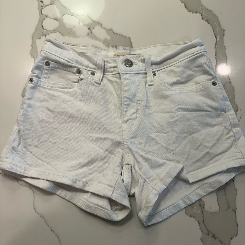 Levi’s white mid length shorts